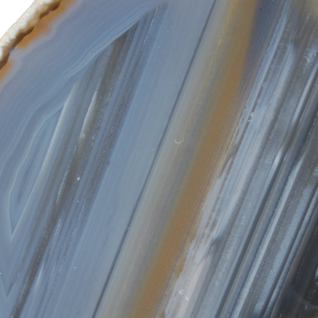 Agate bleue/grise avec la base sciée - motif de la face polie